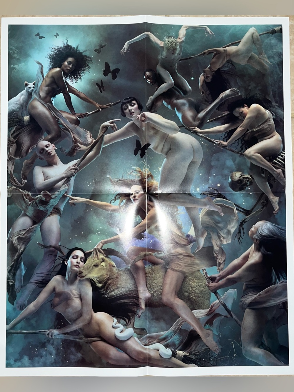 Heretic Parfum Witch poster and newspapers